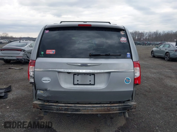 2014 Chrysler Town & Country Touring with VIN 2C4RC1BG1ER343069, listed as a IAAI auction lot 41683253 with 137,978 mi miles and . Bid and sale history available at DreamBid. Image 16.