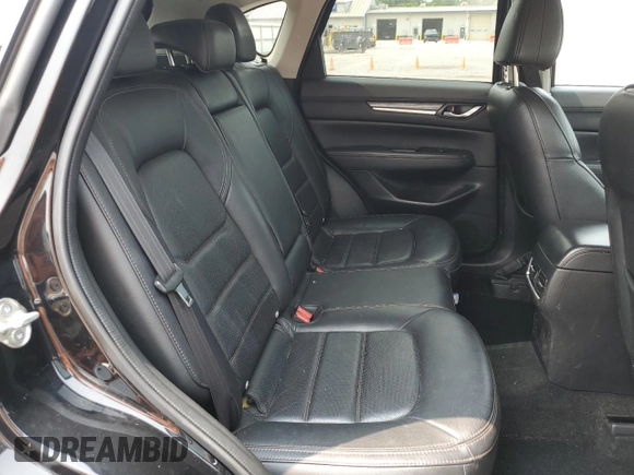 2019 Mazda CX-5 Grand Touring with VIN JM3KFBDM2K0569829, listed as a Copart auction lot 59060965 with 99,359 mi miles and Salvage title. Bid and sale history available at DreamBid. Image 11.