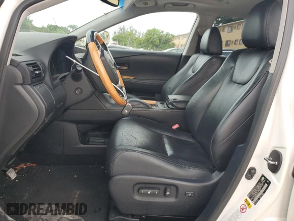 2014 Lexus RX 450h with VIN JTJZB1BA1E2413549, listed as a Copart auction lot 63016085 with 252,309 mi miles and Clean title. Bid and sale history available at DreamBid. Image 7.