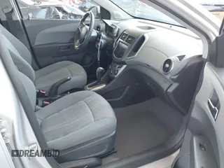 2013 Chevrolet Sonic LT with VIN 1G1JC5SB2D4243632, listed as a IAAI auction lot 42072421 with 40,289 mi miles and . Bid and sale history available at DreamBid. Image 5.