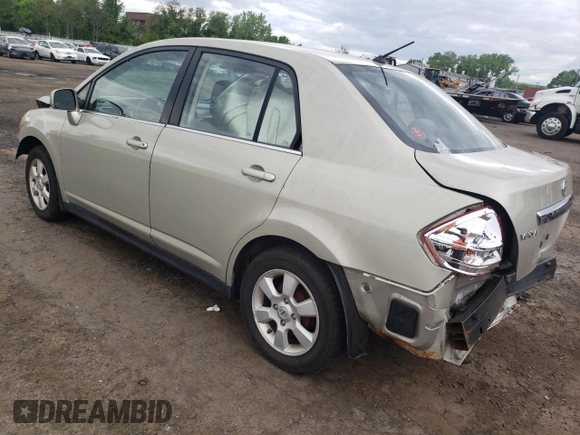 2008 Nissan Versa 1.8 S with VIN 3N1BC11E08L363075, listed as a Copart auction lot 54706934 with 116,191 mi miles and Salvage Title. Bid and sale history available at carsss.com. Image 2.