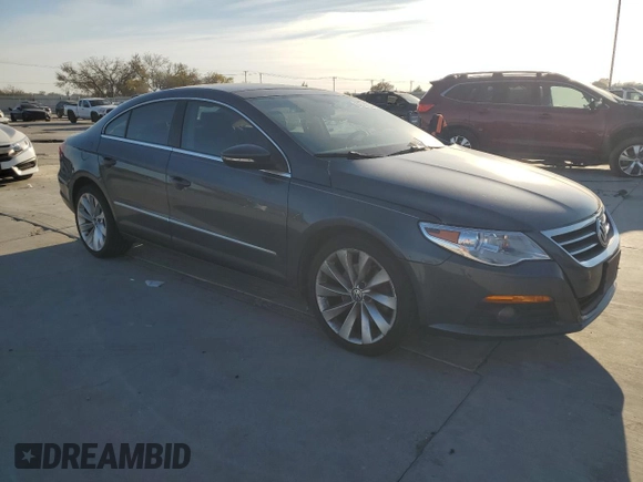 2012 Volkswagen CC Lux Limited with VIN WVWHN7AN5CE537803, listed as a Copart auction lot 82511734 with 124,416 mi miles and Salvage Title. Bid and sale history available at carsss.com. Image 4.