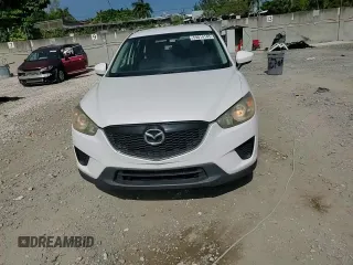 2014 Mazda CX-5 Sport with VIN JM3KE2BE9E0344990, listed as a Copart auction lot 59014145 with 126,905 mi miles and Salvage title. Bid and sale history available at DreamBid. Image 13.