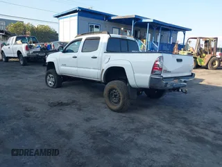2014 Toyota Tacoma with VIN 5TFLU4EN7EX091618, listed as a IAAI auction lot 41774286 with Not Provided miles and . Bid and sale history available at DreamBid. Image 3.