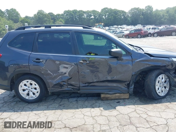 2019 Subaru Forester with VIN JF2SKACC6KH569407, listed as a IAAI auction lot 42682102 with 100,322 mi miles and . Bid and sale history available at DreamBid. Image 14.