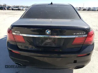 2015 BMW 7 Series 740Li xDrive with VIN WBAYF4C51FGS99088, listed as a Copart auction lot 47593145 with 133,825 mi miles and Salvage Title. Bid and sale history available at carsss.com. Image 6.
