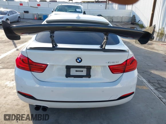 2018 BMW 4 Series 430i with VIN WBA4J1C59JBG77470, listed as a IAAI auction lot 41534689 with 141,710 mi miles and . Bid and sale history available at carsss.com. Image 16.