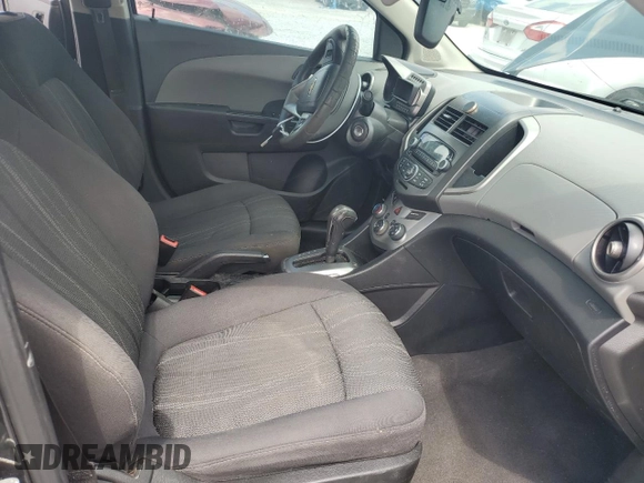 2015 Chevrolet Sonic LT with VIN 1G1JC5SH9F4122040, listed as a Copart auction lot 57750345 with 120,249 mi miles and Salvage title. Bid and sale history available at DreamBid. Image 7.