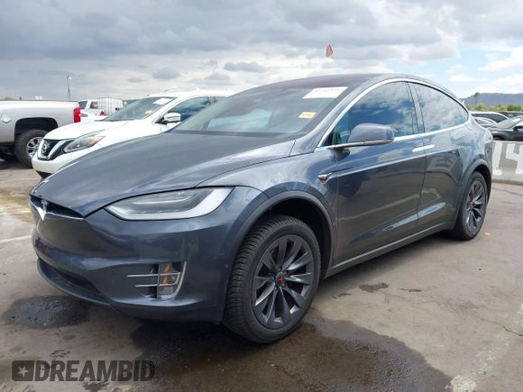 2018 Tesla Model X 75D with VIN 5YJXCBE29JF126629, listed as a IAAI auction lot 42205838 with 47,343 mi miles and . Bid and sale history available at DreamBid. Image 2.