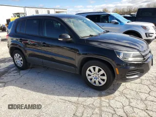 2014 Volkswagen Tiguan with VIN WVGCV3AXXEW604117, listed as a Copart auction lot 78791874 with 194,837 mi miles and Salvage Title. Bid and sale history available at DreamBid. Image 4.