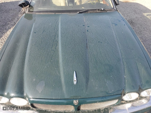 2003 Jaguar XJ with VIN SAJDA12C63LF56705, listed as a Copart auction lot 81903784 with 0 mi miles and Salvage Title. Bid and sale history available at carsss.com. Image 11.
