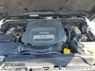 2014 Jeep Wrangler Unlimited Rubicon with VIN 1C4BJWFGXEL292145, listed as a Copart auction lot 53543485 with 121,884 mi miles and Clean Title. Bid and sale history available at carsss.com. Image 12.