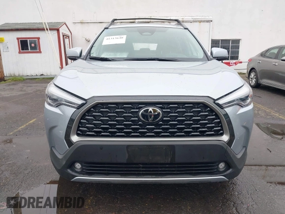 2023 Toyota Corolla Cross XLE z VIN 7MUDAABG0PV077852, wystawiony jako IAAI lot #41313640 z przebiegiem 23 201 mil mil oraz . Historia ofert i sprzedaży dostępna na DreamBid. Obrazek 13.