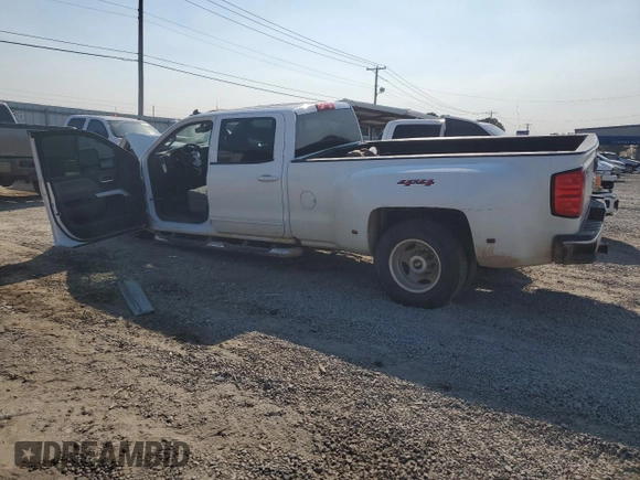 2018 Chevrolet Silverado 3500HD Work Truck with VIN 1GC4KZCG8JF218517, listed as a Copart auction lot 74915614 with 148,040 mi miles and Salvage Title. Bid and sale history available at carsss.com. Image 2.