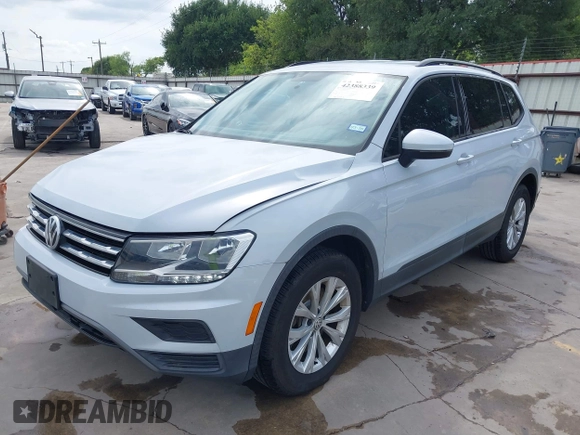 2018 Volkswagen Tiguan S with VIN 3VV1B7AX0JM092116, listed as a IAAI auction lot 42388339 with 103,412 mi miles and . Bid and sale history available at DreamBid. Image 20.