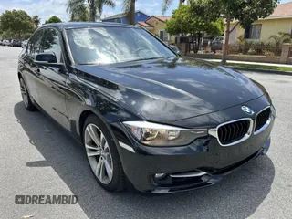 2014 BMW 3 Series 328i with VIN WBA3C1C52EK108680, listed as a IAAI auction lot 42153830 with 73,464 mi miles. Bid and sale history available at carsss.com. Image 1.