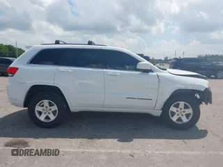 2015 Jeep Grand Cherokee Altitude with VIN 1C4RJEAG3FC722499, listed as a IAAI auction lot 41894727 with 105,616 mi miles. Bid and sale history available at carsss.com. Image 14.