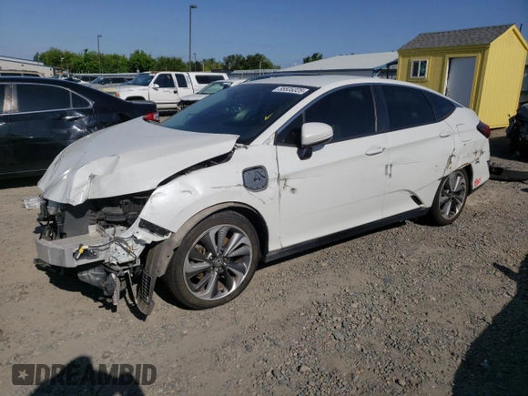2018 Honda Clarity Touring z VIN JHMZC5F33JC002904, wystawiony jako Copart lot #55535325 z przebiegiem Nie podano mil oraz Szkoda całkowita • Salvage title. Historia ofert i sprzedaży dostępna na DreamBid. Obrazek 1.