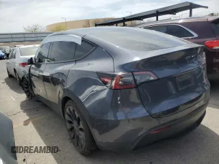 2022 Tesla Model Y Performance with VIN 7SAYGDEF1NF491967, listed as a Copart auction lot 51119515 with 50,520 mi miles and Salvage title. Bid and sale history available at DreamBid. Image 2.