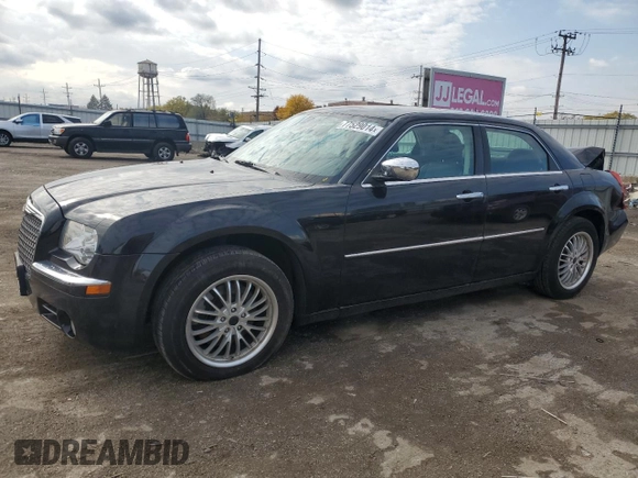2009 Chrysler 300 with VIN 2C3LK33V19H614083, listed as a Copart auction lot 77529014 with 188,125 mi miles and Salvage title. Bid and sale history available at DreamBid. Image 1.
