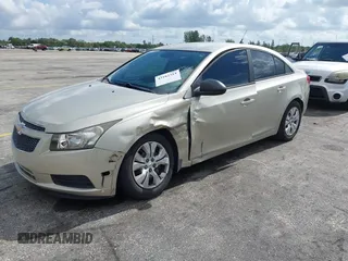 2014 Chevrolet Cruze LS with VIN 1G1PA5SH8E7326020, listed as a IAAI auction lot 42182314 with 65,000 mi miles and . Bid and sale history available at DreamBid. Image 2.