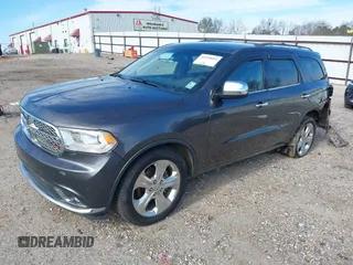 2015 Dodge Durango SXT with VIN 1C4RDHAG0FC771247, listed as a IAAI auction lot 41255016 with 171,668 mi miles and . Bid and sale history available at DreamBid. Image 2.