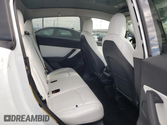 2021 Tesla Model Y Performance with VIN 5YJYGDEF4MF201815, listed as a Copart auction lot 42453075 with 76,888 mi miles and Salvage Title. Bid and sale history available at DreamBid. Image 12.