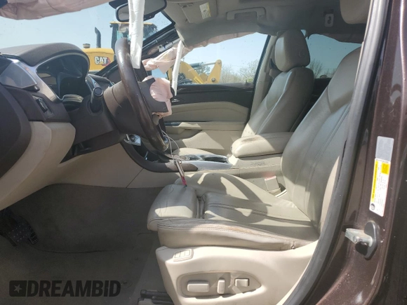 2015 Cadillac SRX Performance Collection z VIN 3GYFNCE30FS533686, wystawiony jako Copart lot #49820745 z przebiegiem 134 363 mil mil oraz Szkoda całkowita • Salvage title. Historia ofert i sprzedaży dostępna na DreamBid. Obrazek 7.