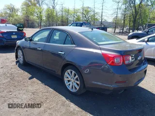 2013 Chevrolet Malibu LTZ with VIN 1G11J5SX6DF335333, listed as a IAAI auction lot 42135480 with 158,743 mi miles and . Bid and sale history available at DreamBid. Image 3.