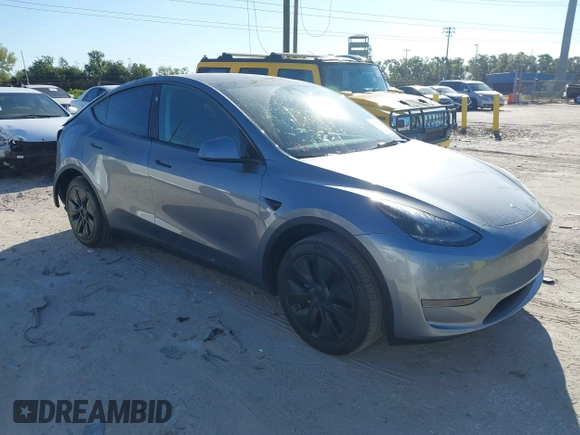 2025 Tesla Model Y Long Range with VIN 7SAYGDED7SA376233, listed as a IAAI auction lot 41777876 with 70 mi miles and . Bid and sale history available at DreamBid. Image 1.