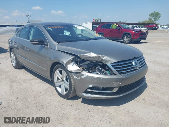 2013 Volkswagen CC Sport with VIN WVWBN7AN2DE555375, listed as a IAAI auction lot 42048643 with 125,484 mi miles and . Bid and sale history available at DreamBid. Image 1.