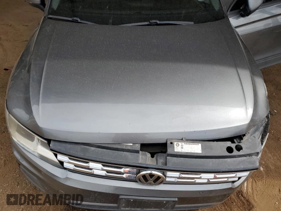 2018 Volkswagen Tiguan S with VIN 3VV1B7AXXJM054778, listed as a Copart auction lot 61294795 with 87,330 mi miles and Salvage title. Bid and sale history available at DreamBid. Image 11.