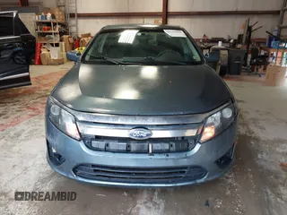 2012 Ford Fusion SE z VIN 3FAHP0HA8CR298495, wystawiony jako IAAI lot #42245859 z przebiegiem 192 979 mil mil oraz . Historia ofert i sprzedaży dostępna na DreamBid. Obrazek 12.