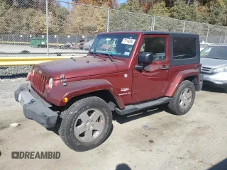 2010 Jeep Wrangler Sahara z VIN 1J4GA5D16AL225139, wystawiony jako Copart lot #77114204 z przebiegiem Nie podano mil oraz Szkoda całkowita • Salvage title. Historia ofert i sprzedaży dostępna na DreamBid. Obrazek 1.