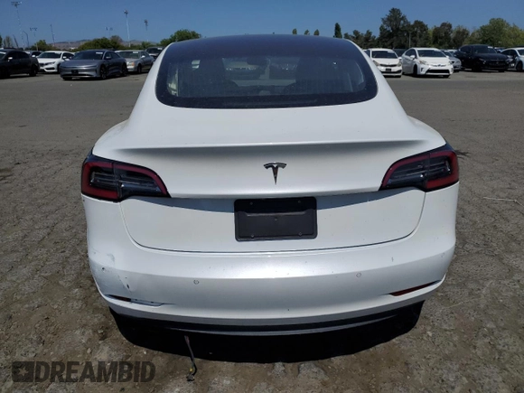 2019 Tesla Model 3 Mid Range with VIN 5YJ3E1EA3KF425125, listed as a Copart auction lot 56072995 with 105,345 mi miles and Salvage Title. Bid and sale history available at DreamBid. Image 6.