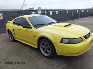 2001 Ford Mustang GT Deluxe z VIN 1FAFP42X81F196894, wystawiony jako IAAI lot #42491528 z przebiegiem 76 853 mil mil oraz . Historia ofert i sprzedaży dostępna na DreamBid. Obrazek 1.