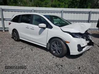 2025 Honda Odyssey Touring with VIN 5FNRL6H87SB001792, listed as a Copart auction lot 51049255 with Not provided miles and Salvage title. Bid and sale history available at DreamBid. Image 4.