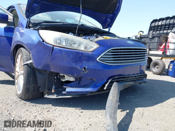 2015 Ford Focus Titanium z VIN 1FADP3N25FL291844, wystawiony jako IAAI lot #42383067 z przebiegiem 82 545 mil mil oraz . Historia ofert i sprzedaży dostępna na DreamBid. Obrazek 6.