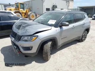 2021 Jeep Compass Trailhawk with VIN 3C4NJDDB9MT527131, listed as a IAAI auction lot 41789250 with 54,180 mi miles and . Bid and sale history available at carsss.com. Image 2.
