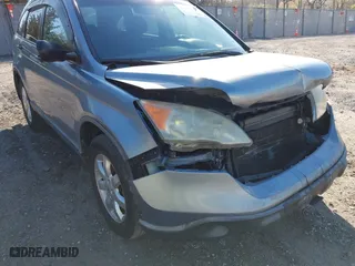 2007 Honda CR-V EX with VIN JHLRE48577C024338, listed as a IAAI auction lot 42068770 with 197,943 mi miles. Bid and sale history available at carsss.com. Image 13.