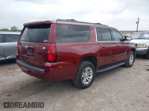2020 Chevrolet Suburban LT z VIN 1GNSCHKC9LR233596, wystawiony jako IAAI lot #41943325 z przebiegiem 97 515 mil mil oraz . Historia ofert i sprzedaży dostępna na DreamBid. Obrazek 4.