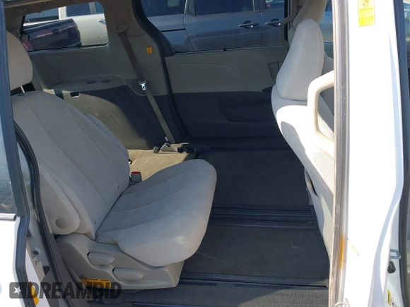 2013 Toyota Sienna LE AAS with VIN 5TDKK3DC2DS354582, listed as a IAAI auction lot 41360766 with 169,978 mi miles. Bid and sale history available at carsss.com. Image 8.