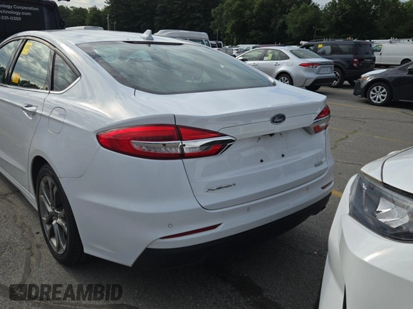 2020 Ford Fusion SEL with VIN 3FA6P0CD1LR154201, listed as a IAAI auction lot 42715761 with 99,448 mi miles and . Bid and sale history available at DreamBid. Image 49.