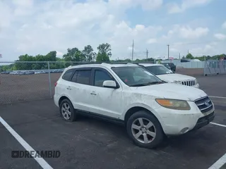 2007 Hyundai Santa Fe SE z VIN 5NMSH13E57H023587, wystawiony jako IAAI lot #42560038 z przebiegiem 188 366 mil mil oraz . Historia ofert i sprzedaży dostępna na DreamBid. Obrazek 1.