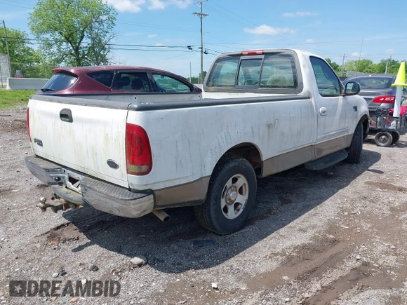 2002 Ford F-150 XL with VIN 2FTRF17W42CA29034, listed as a IAAI auction lot 42134017 with Not Provided miles and . Bid and sale history available at DreamBid. Image 4.