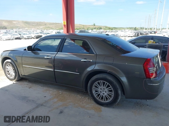 2010 Chrysler 300 Touring with VIN 2C3CA5CV5AH233033, listed as a IAAI auction lot 42130676 with 158,323 mi miles and . Bid and sale history available at DreamBid. Image 14.