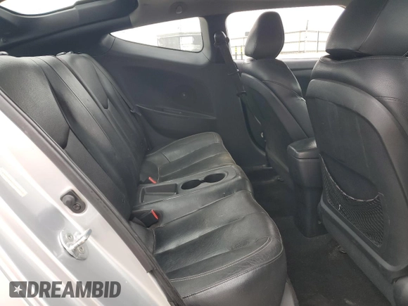 2013 Hyundai Veloster Turbo z VIN KMHTC6AE2DU158240, wystawiony jako Copart lot #54719205 z przebiegiem 147 652 mil mil oraz Szkoda całkowita • Salvage title. Historia ofert i sprzedaży dostępna na DreamBid. Obrazek 10.