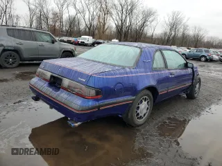 1988 Ford Thunderbird with VIN 1FABP64T6JH176166, listed as a Copart auction lot 84049064 with 80,091 mi miles and Salvage Title. Bid and sale history available at DreamBid. Image 3.
