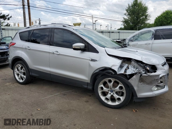 2013 Ford Escape Titanium с VIN 1FMCU9J92DUD31093, выставлен на аукционе Copart как лот 57121425 с пробегом 107 979 миль миль и Списание • Salvage title. История ставок и продаж доступна на DreamBid. Изображение 4.