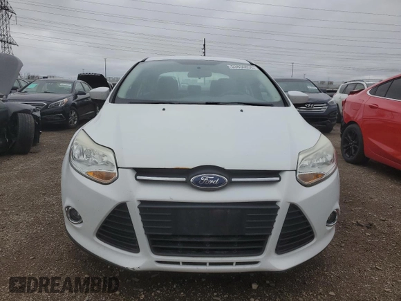 2012 Ford Focus SE z VIN 1FAHP3F28CL399774, wystawiony jako Copart lot #53830855 z przebiegiem 175 442 mil mil oraz Czysty tytuł • Clean title. Historia ofert i sprzedaży dostępna na DreamBid. Obrazek 5.